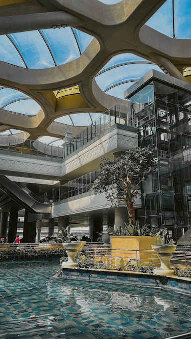 a large building with a pool inside of it