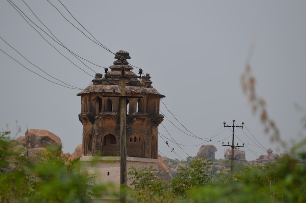 a tower with a clock on the top of it