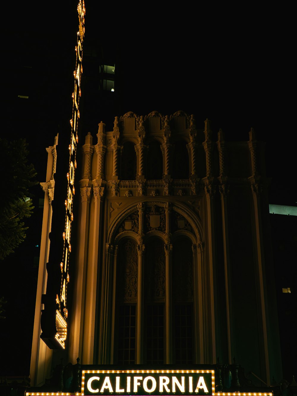 a large building with lights on it at night