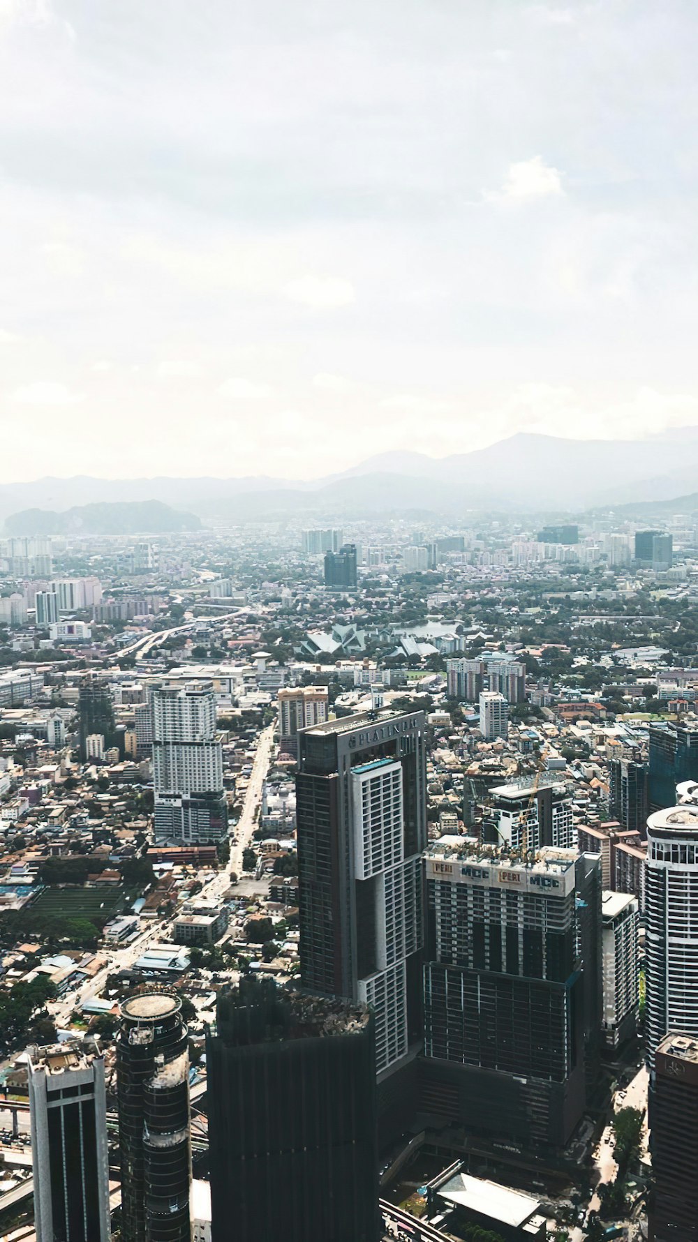 a view of a city from the top of a building