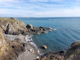 a view of the ocean from a cliff