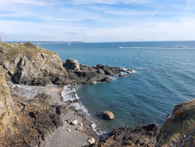 a view of the ocean from a cliff