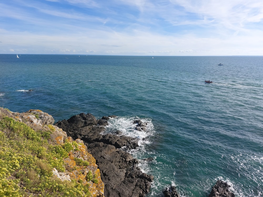 a view of the ocean from a cliff