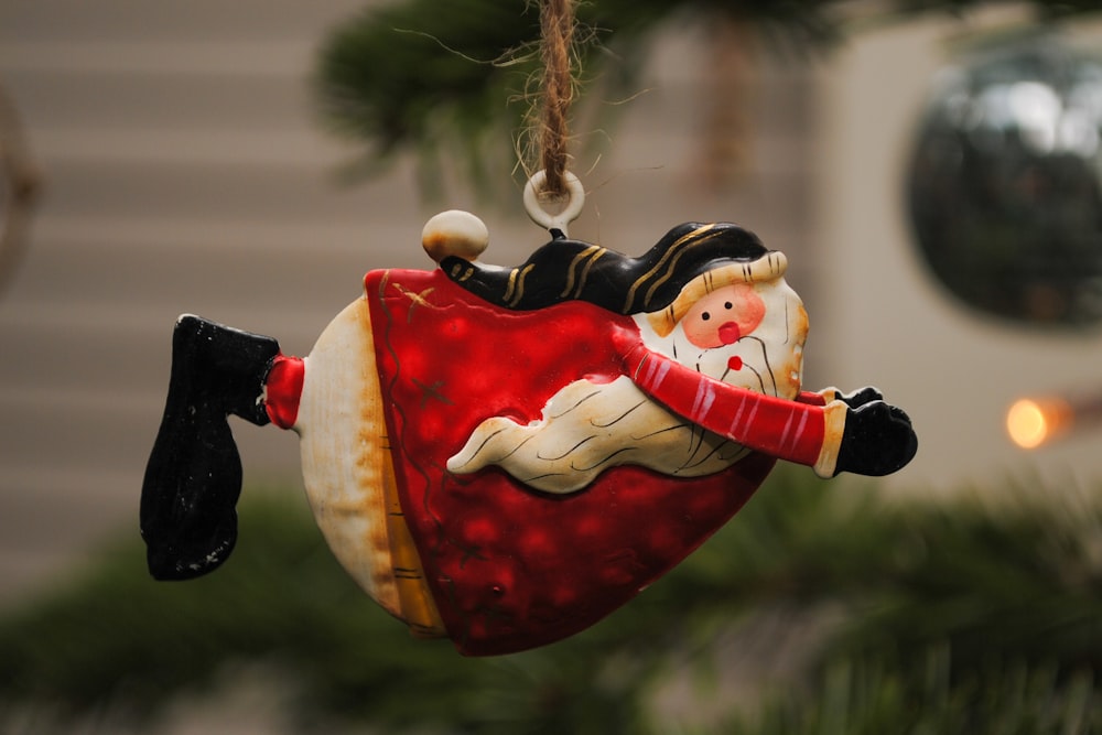 a christmas ornament hanging from a christmas tree