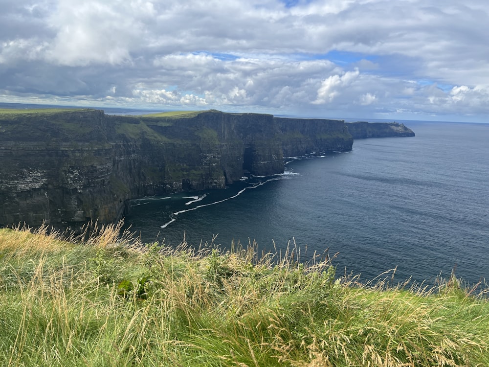 a view of the ocean from a cliff