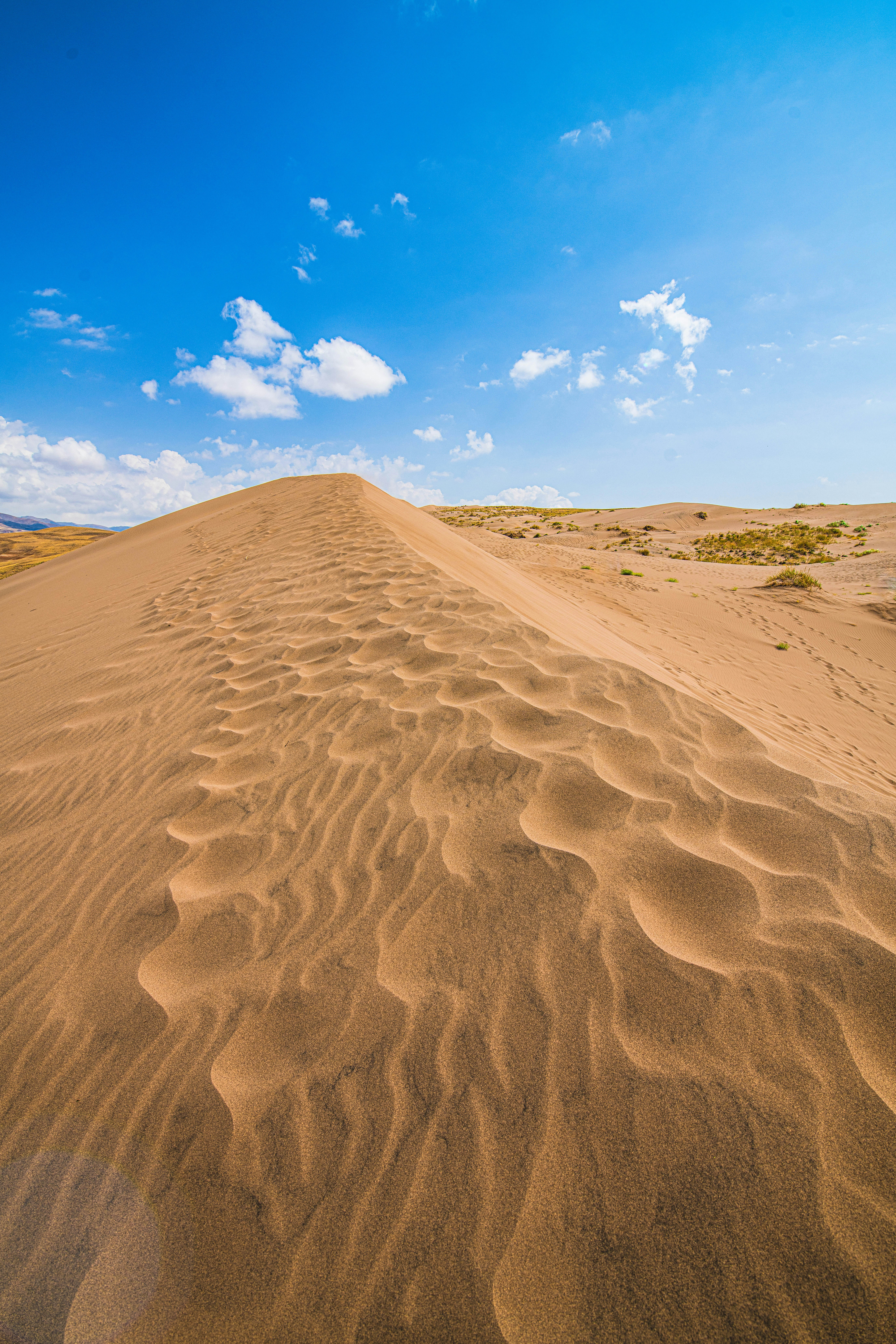 A large sand dune in the middle of a desert photo – Free Natural Image ...