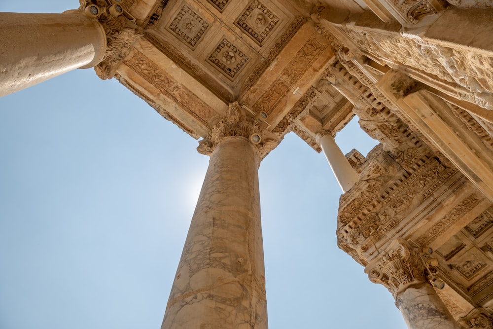 looking up at the ceiling of a roman temple