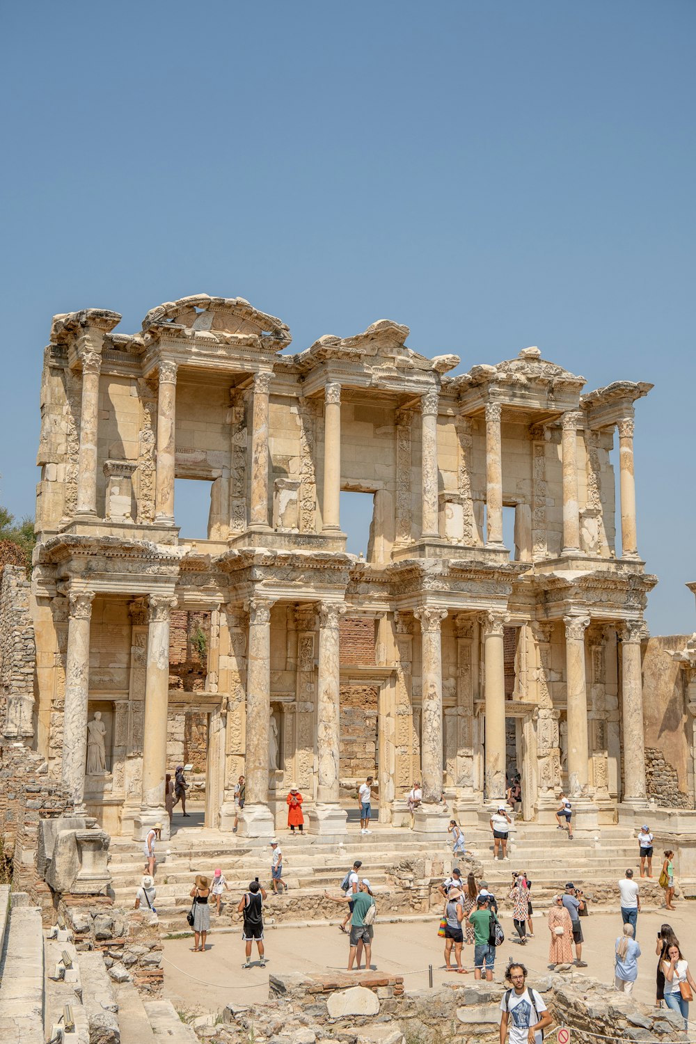 a group of people standing in front of a building