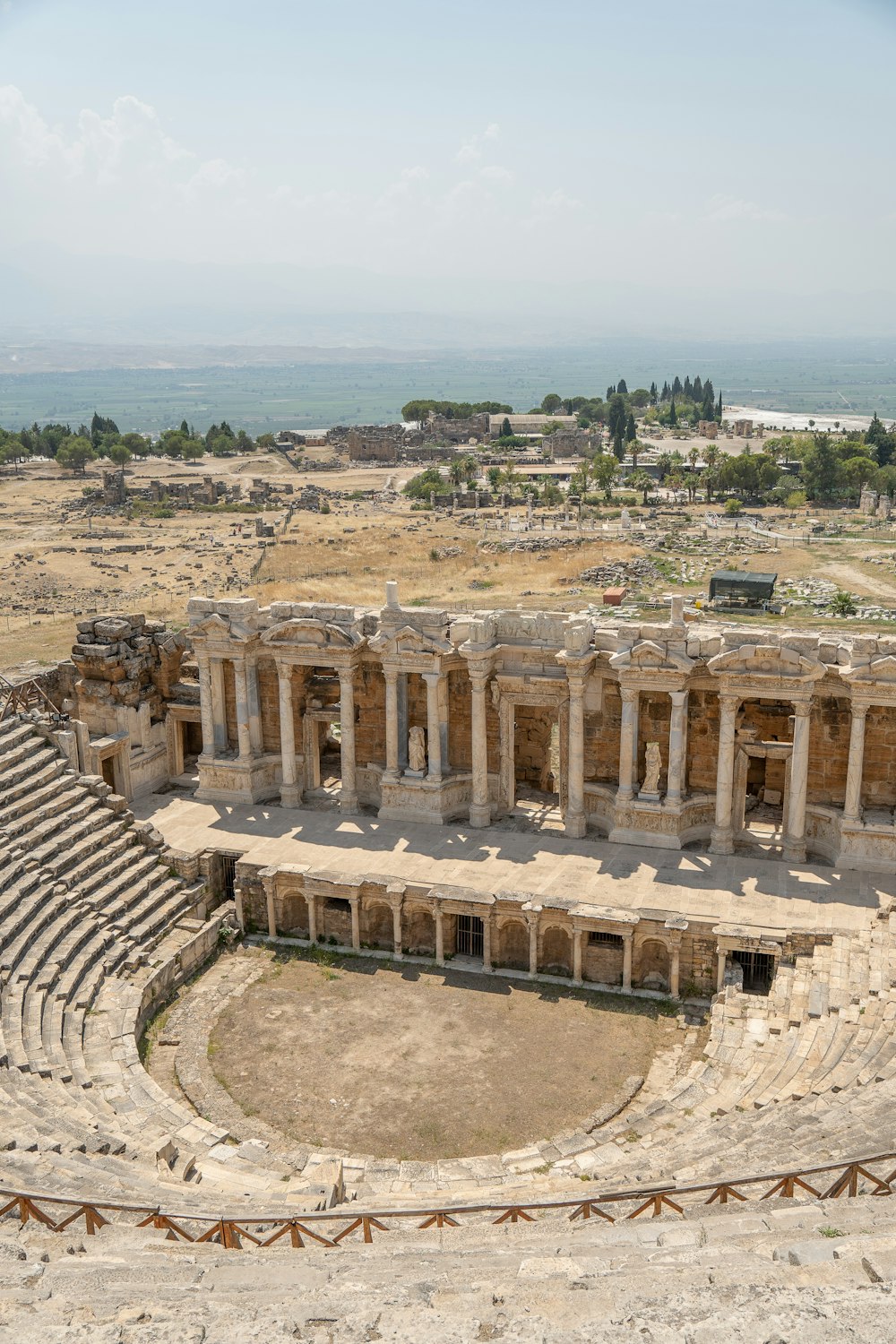 an old theater with a view of the ruins