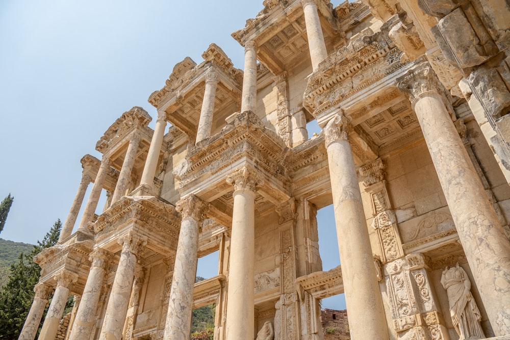 a bunch of columns that are standing in the dirt