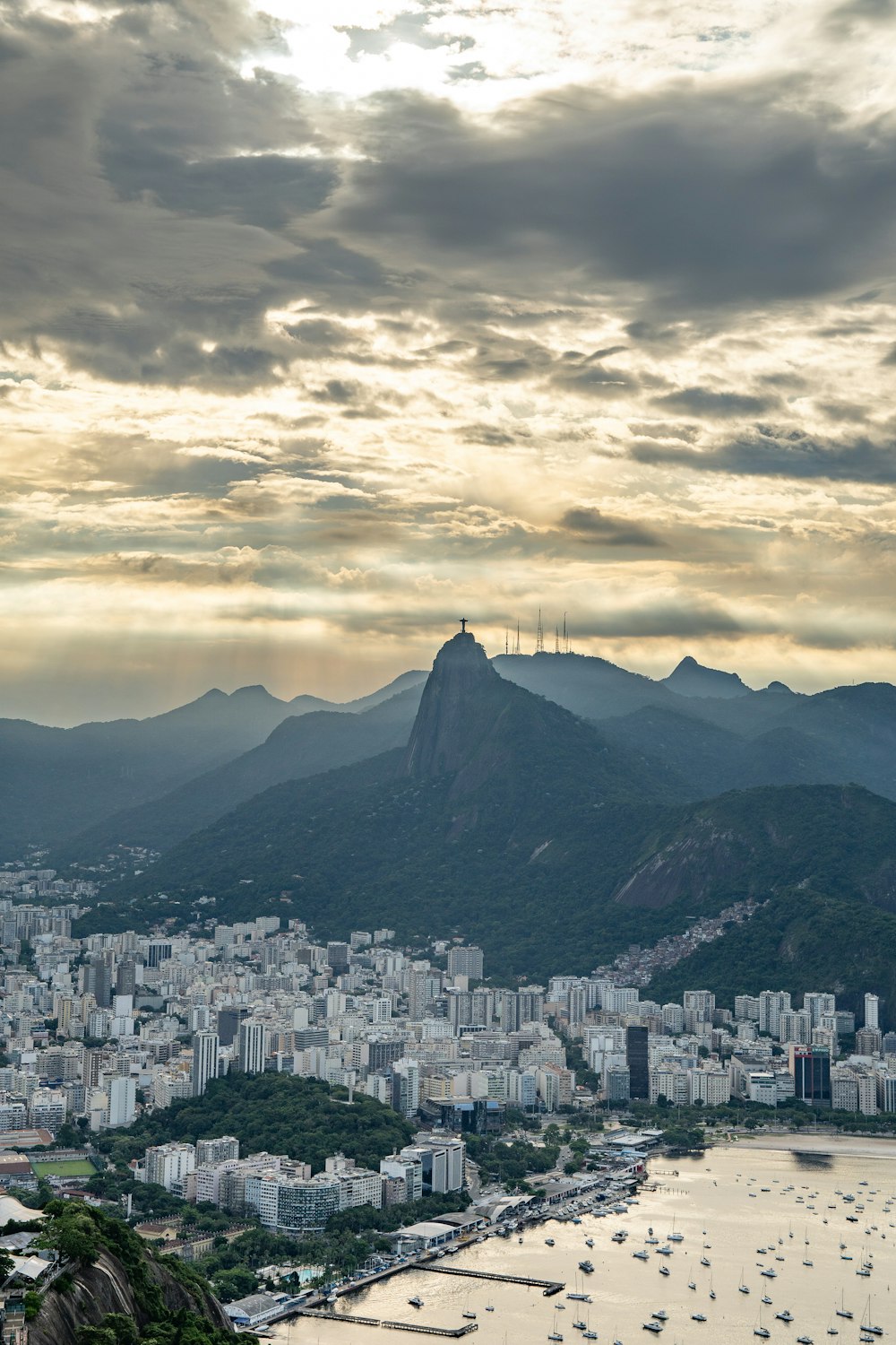 a view of a city with mountains in the background