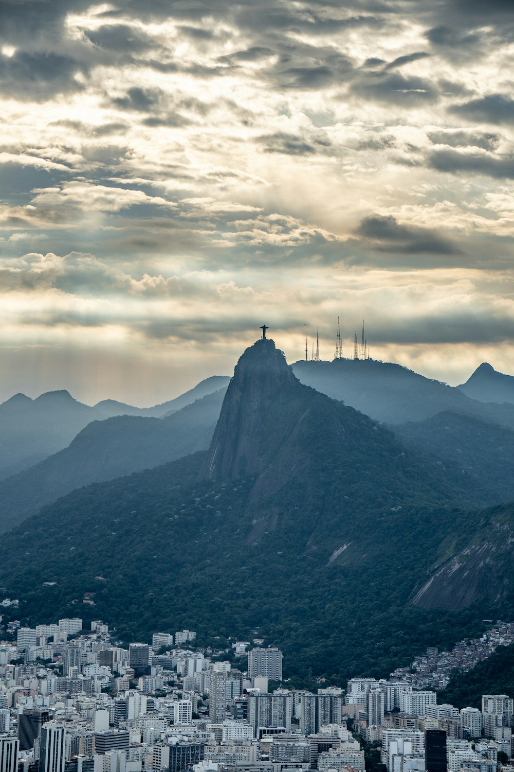 a view of a city with a mountain in the background