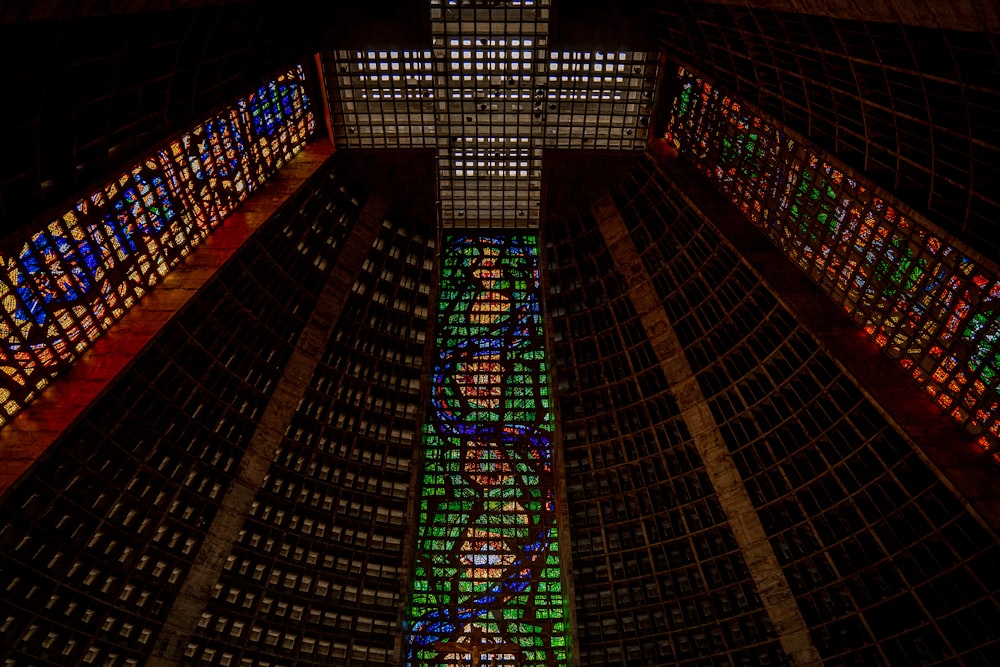 a large stained glass window in a building