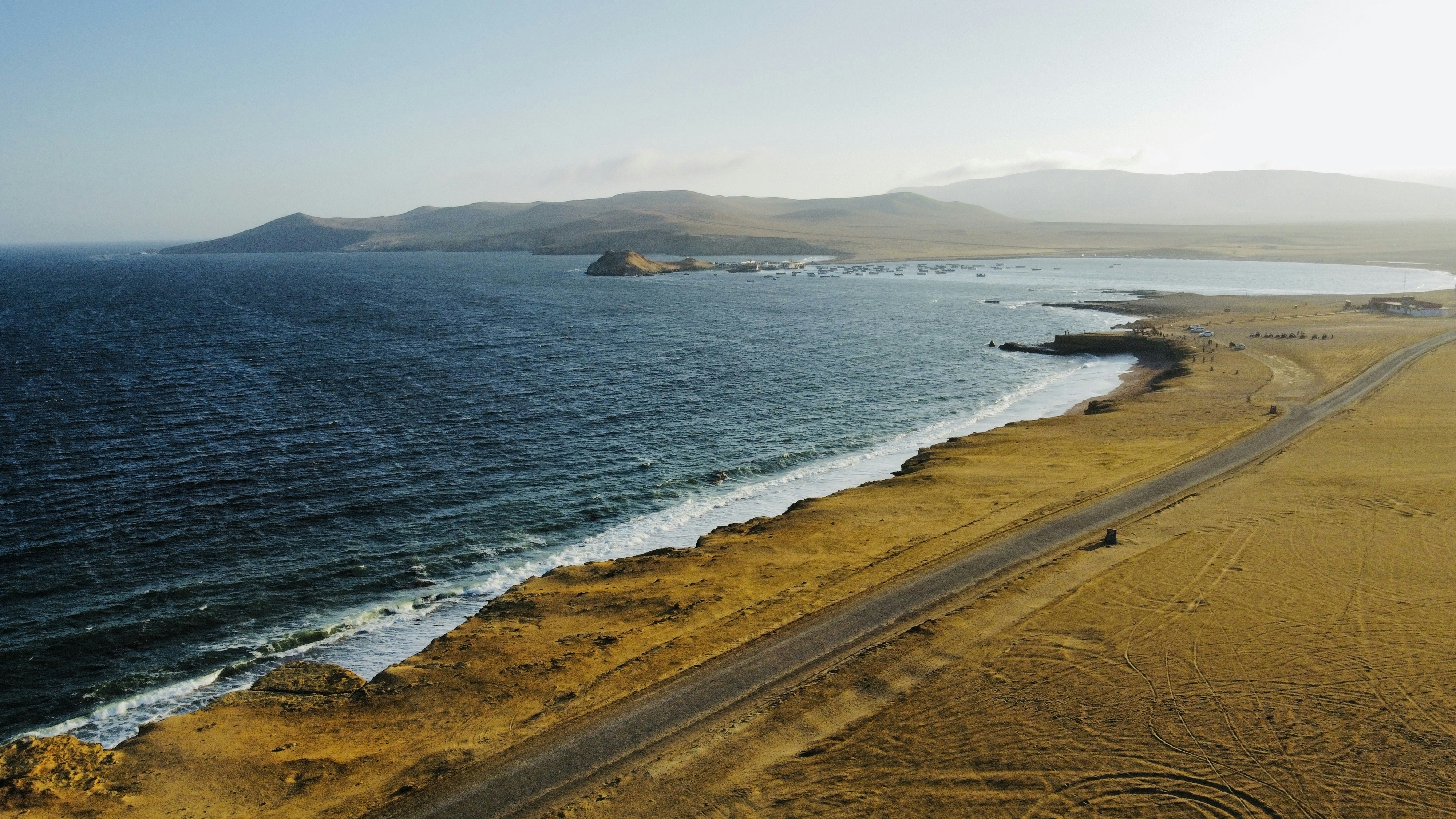 an aerial view of a beach and a body of water