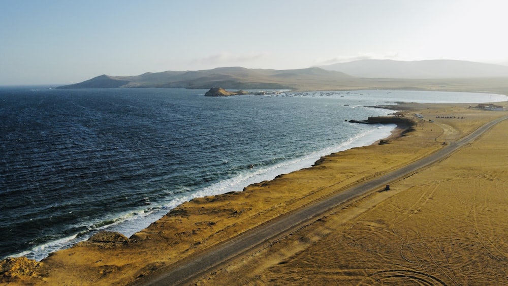 an aerial view of a beach and a body of water