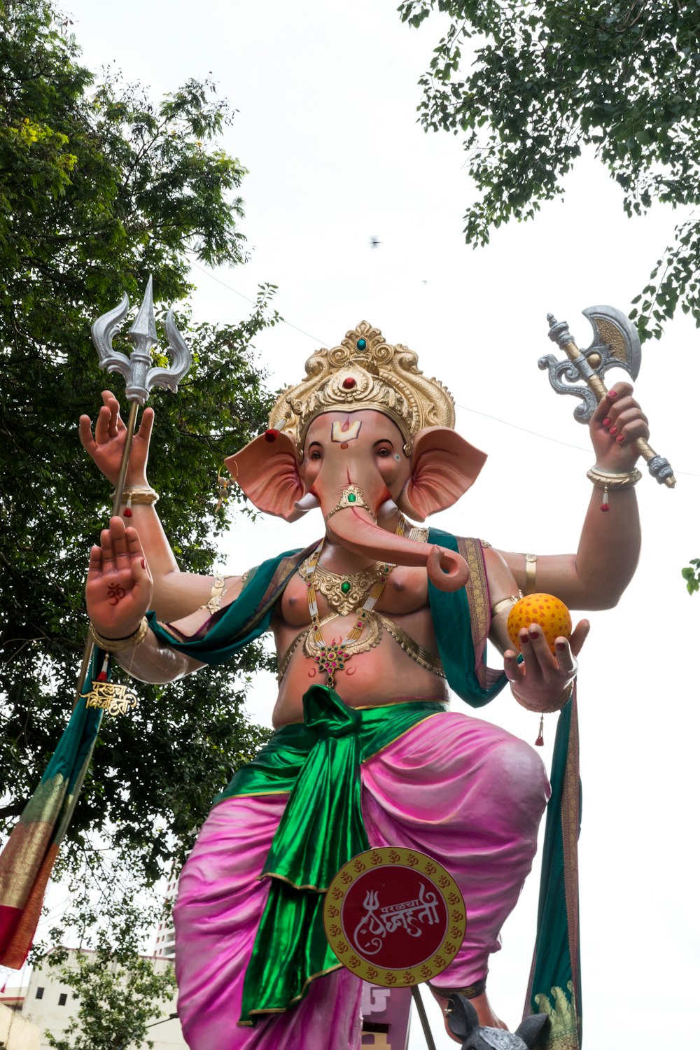 a statue of an elephant with a crown on it's head