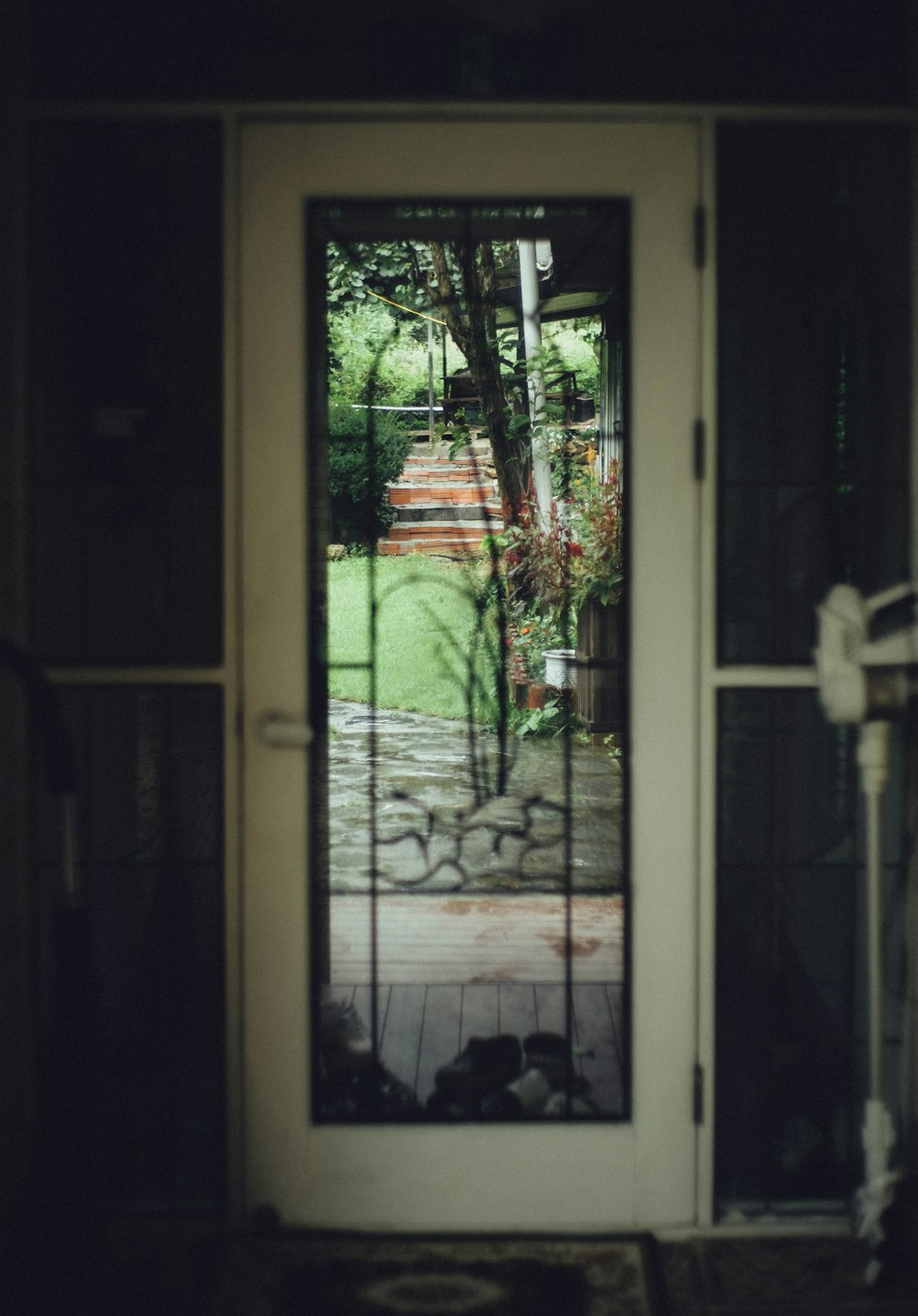 a view of a front door through a glass window