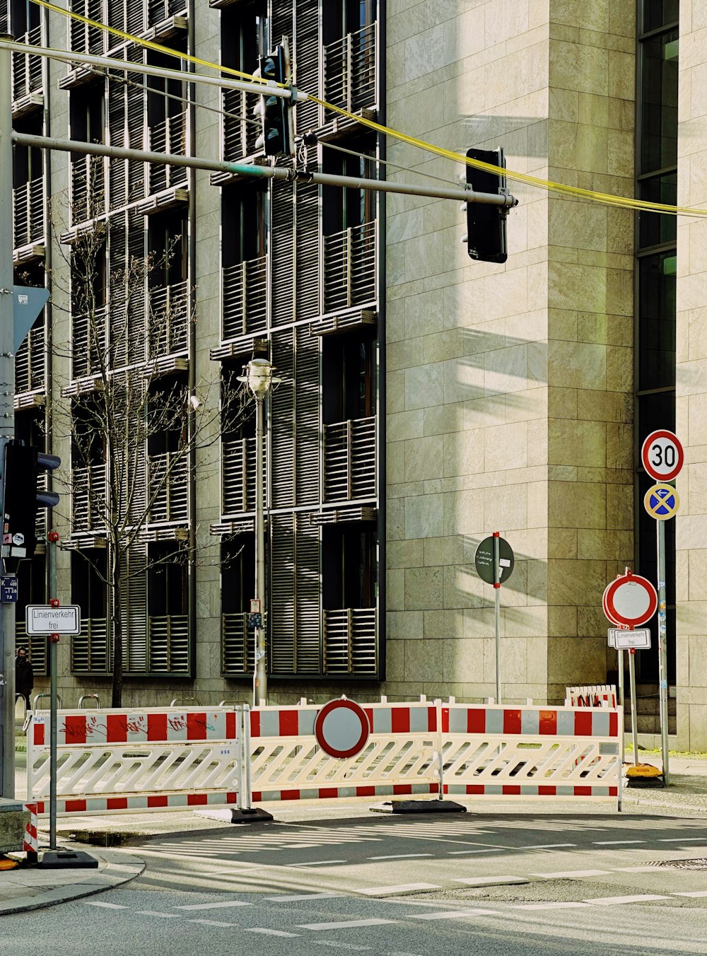 a traffic light sitting on the side of a road