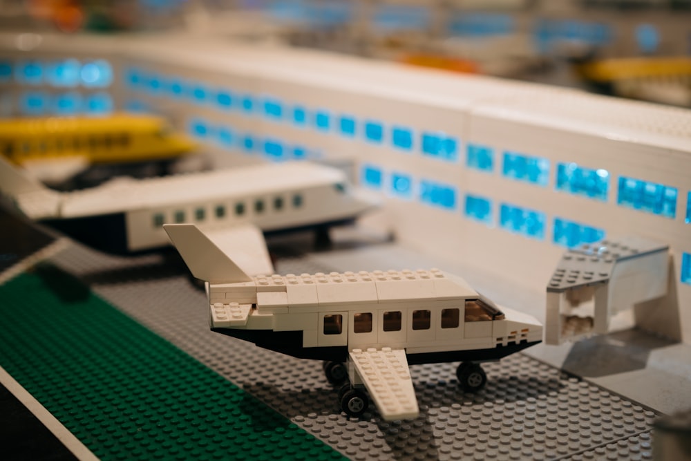 a lego model of a small airplane on a table