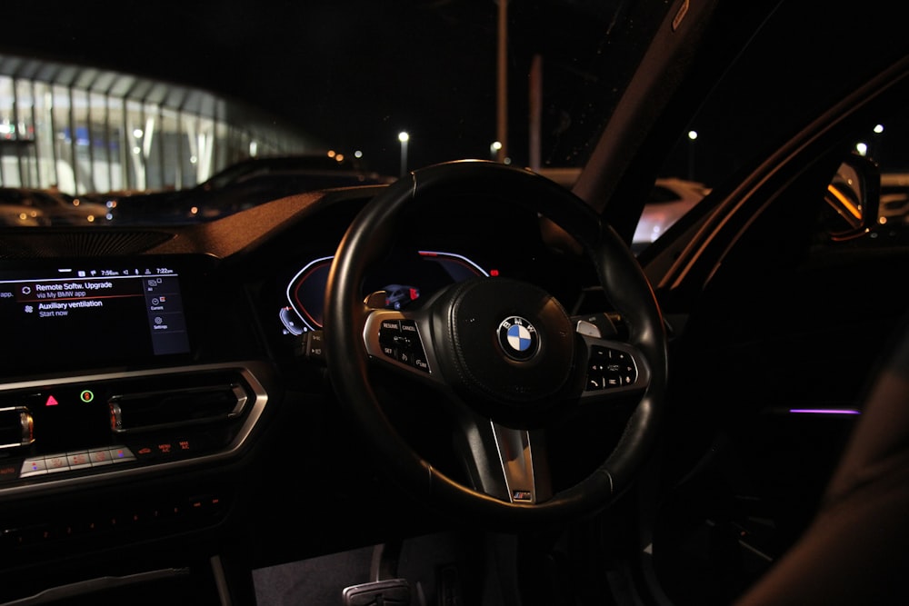 the interior of a car at night with a dashboard