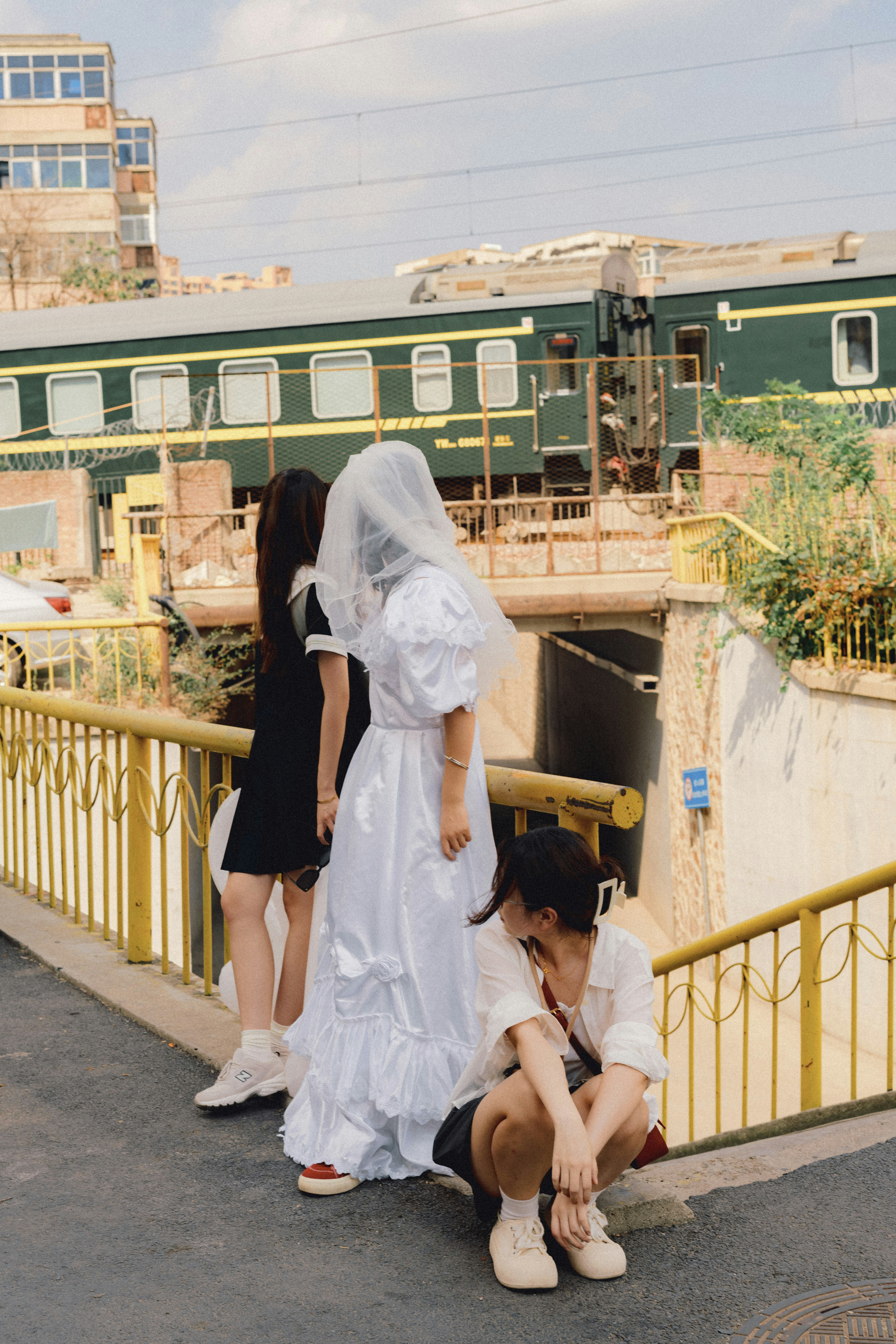 a couple of people that are sitting on the ground