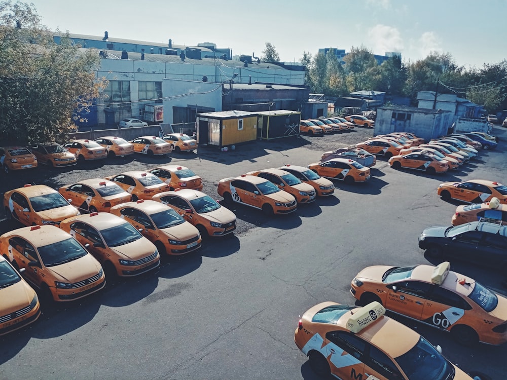 a parking lot filled with lots of parked cars