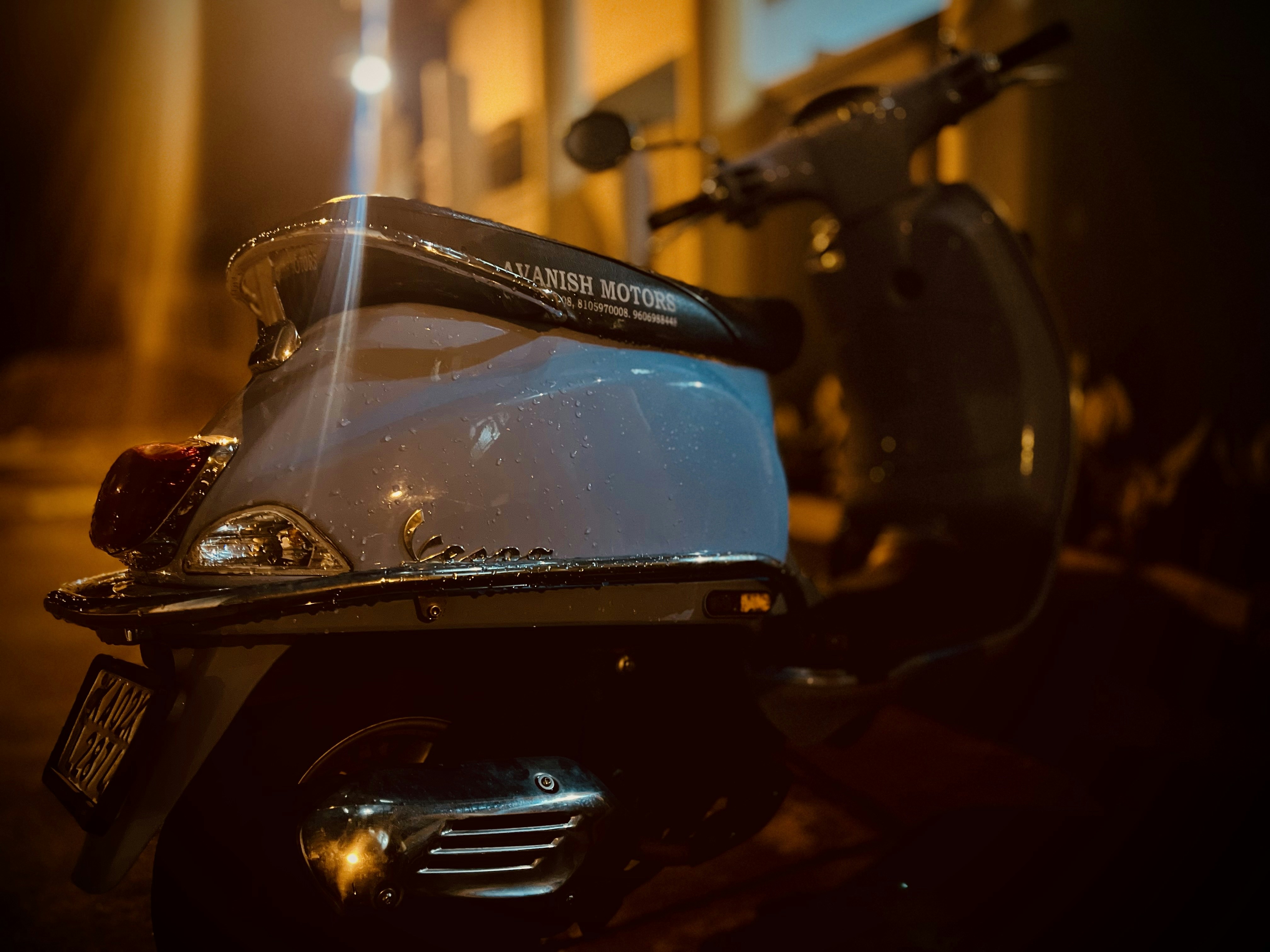 Close-up of a sleek scooter ready for rental in a cozy Da Lat street