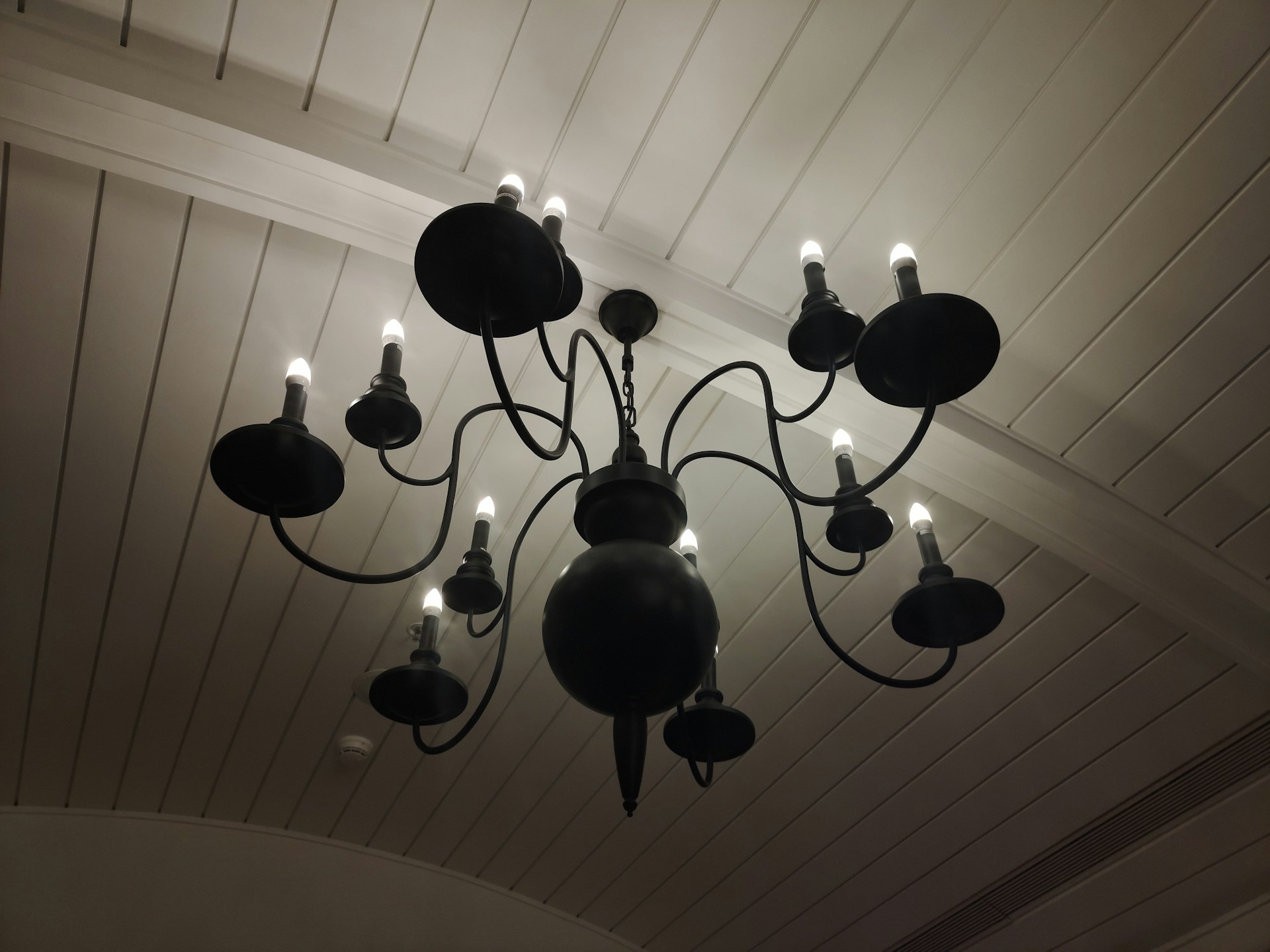 woman wearing yellow long-sleeved dress under white clouds and blue sky during daytime