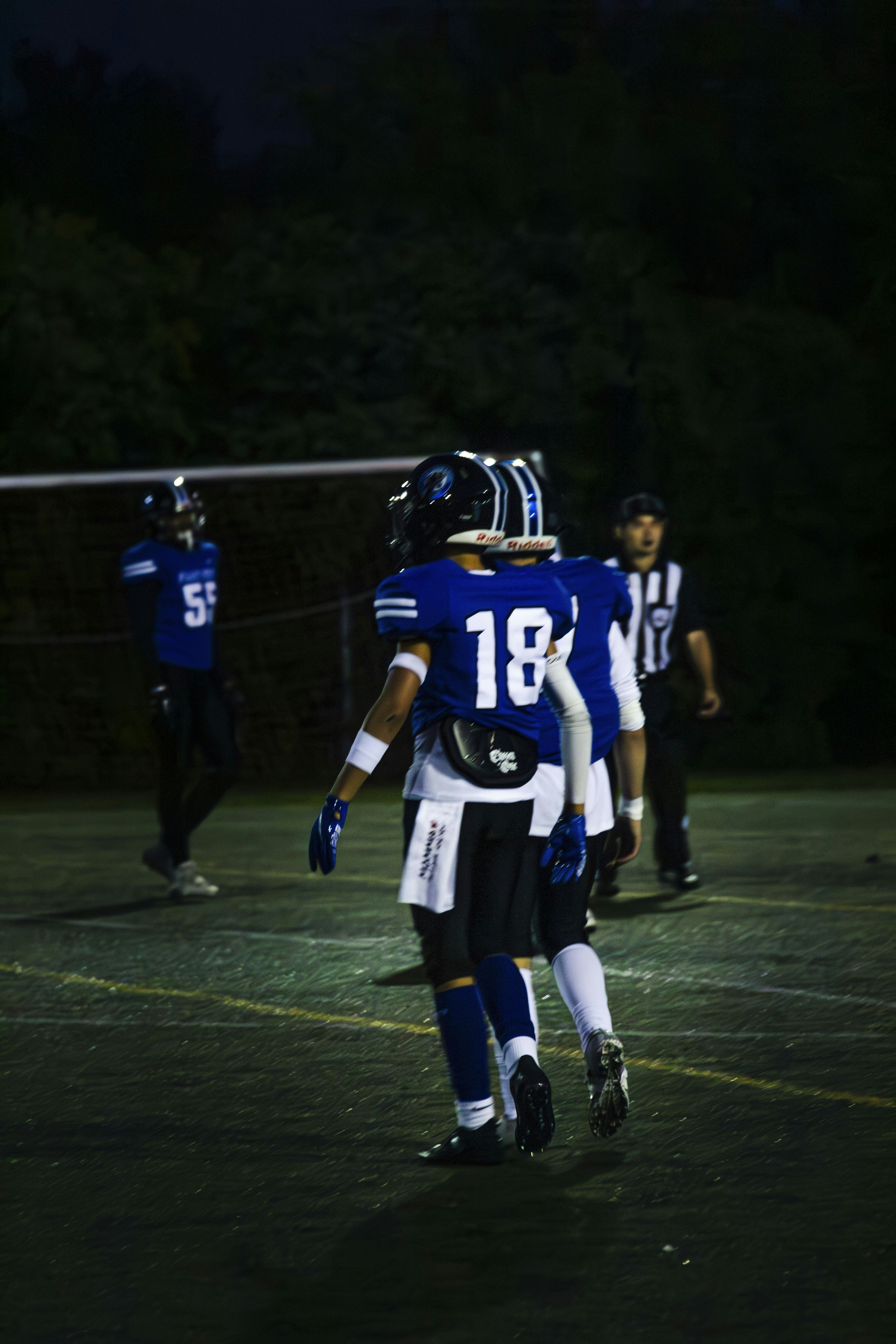 a group of young men playing a game of football
