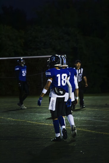 a group of young men playing a game of football