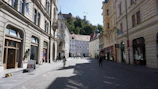 Historic European city street with charming architecture and cobblestones.