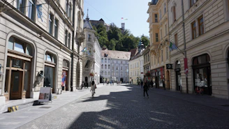 Historic streets of Prague with colorful buildings and cobblestone paths.