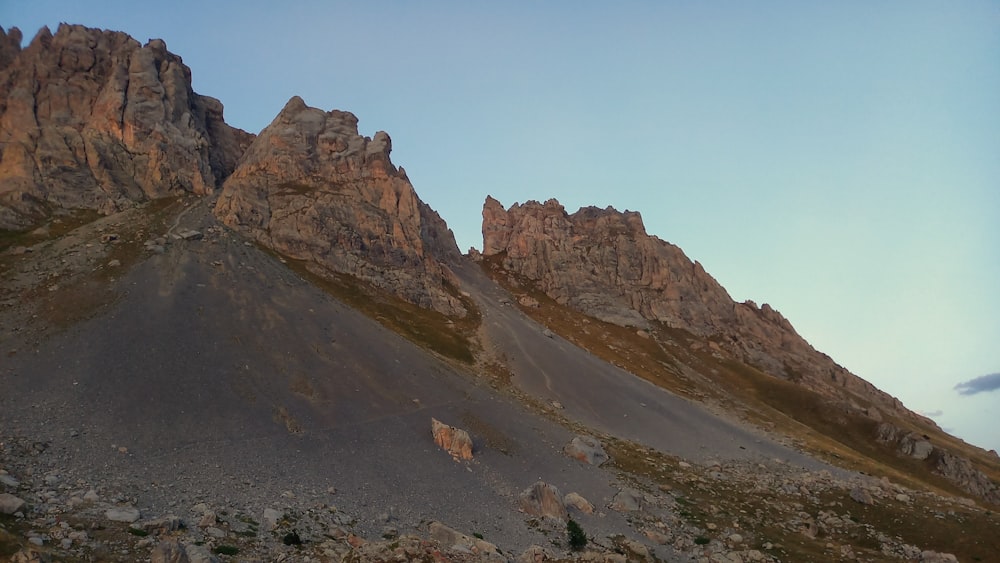 a very tall mountain with some rocks on it