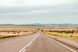 an empty road in the middle of nowhere
