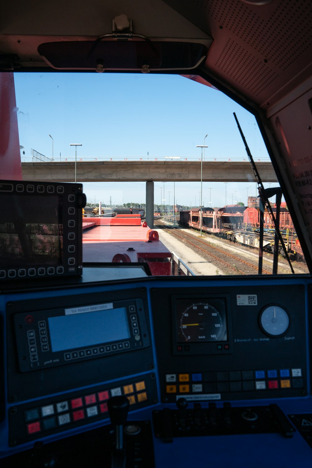 a view of a train from inside a vehicle