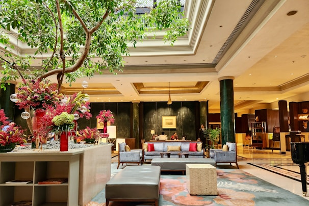 Luxurious hotel lobby featuring elegant decor and comfortable seating.