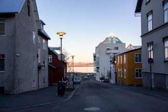 A scenic view of a peaceful foreign city street, capturing the essence of a diplomat’s new home.