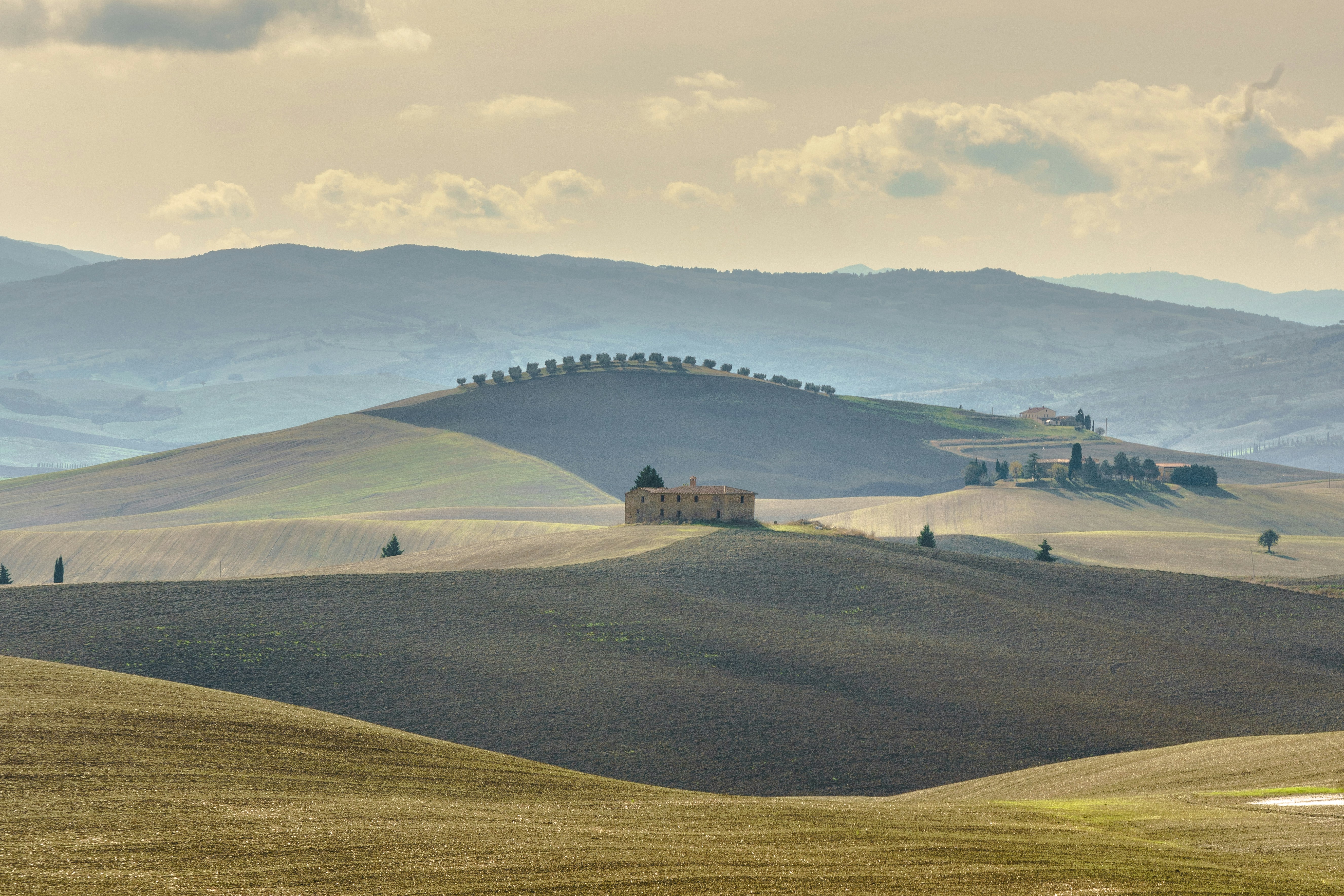 A view of a hill with a castle on top of it