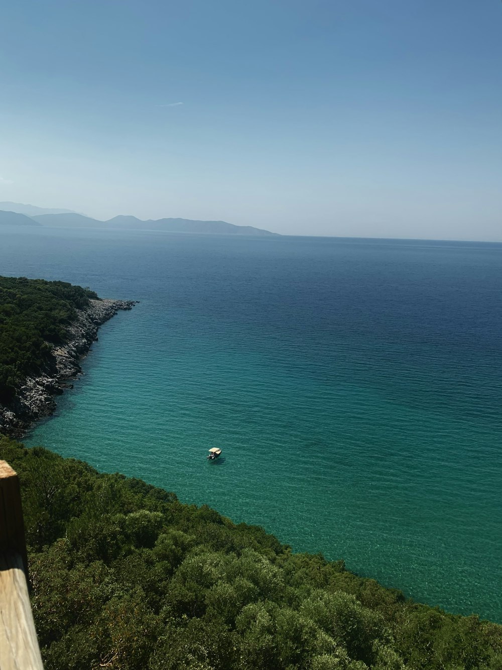 a view of a body of water from a hill