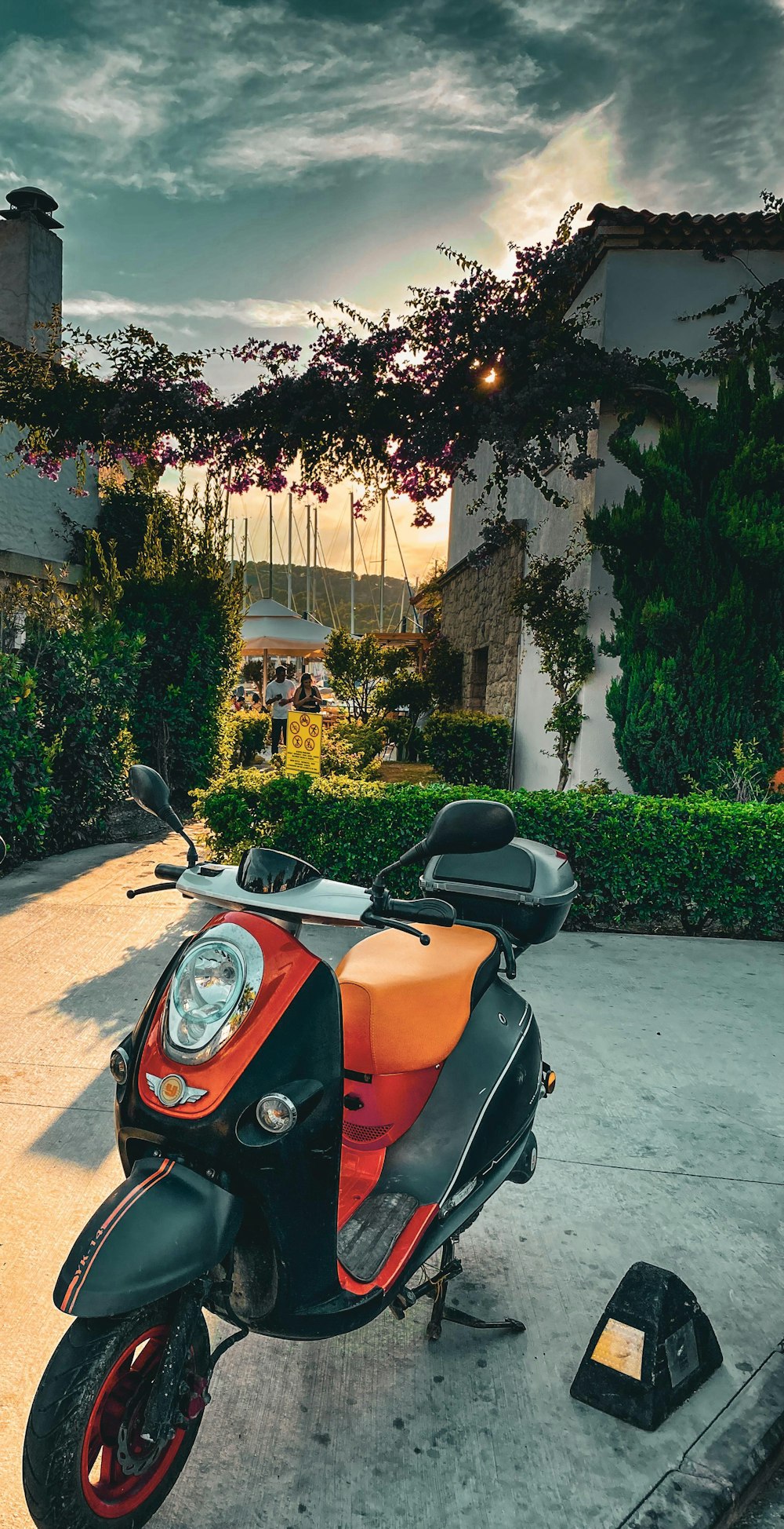 a scooter parked in front of a house