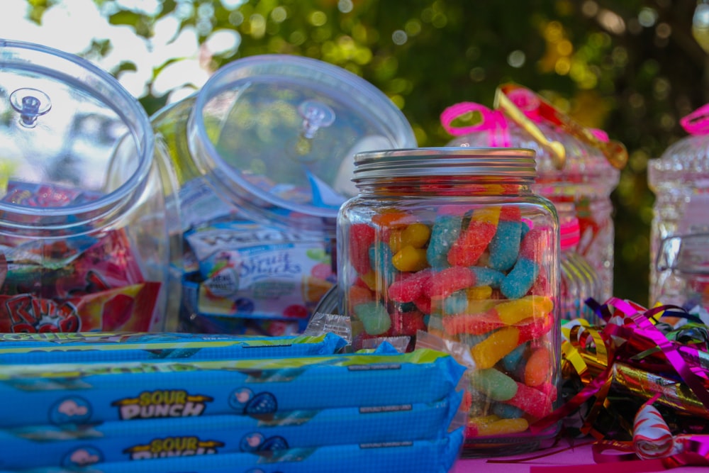 a table topped with lots of candy and candies