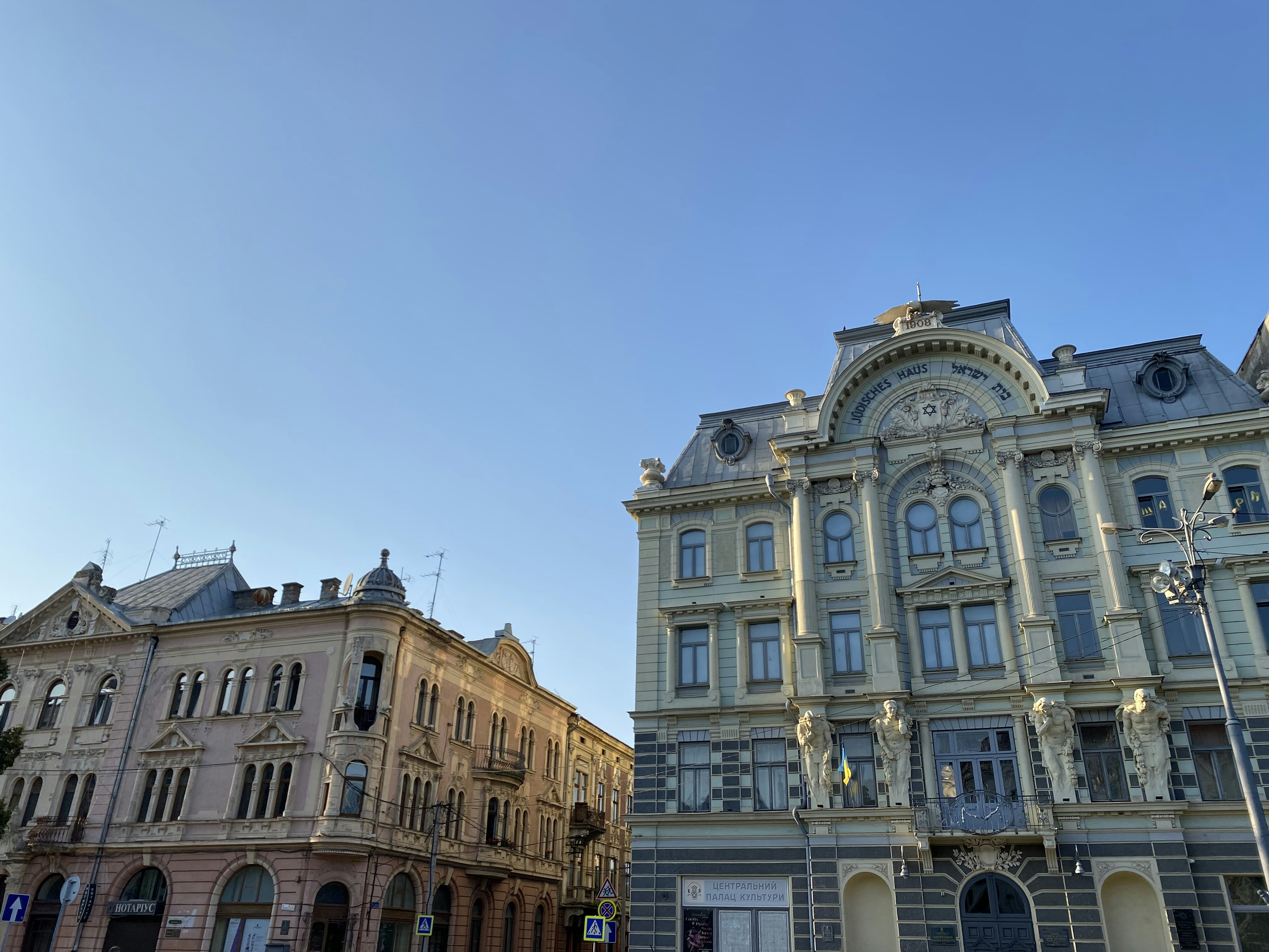 a large building with a clock on the front of it