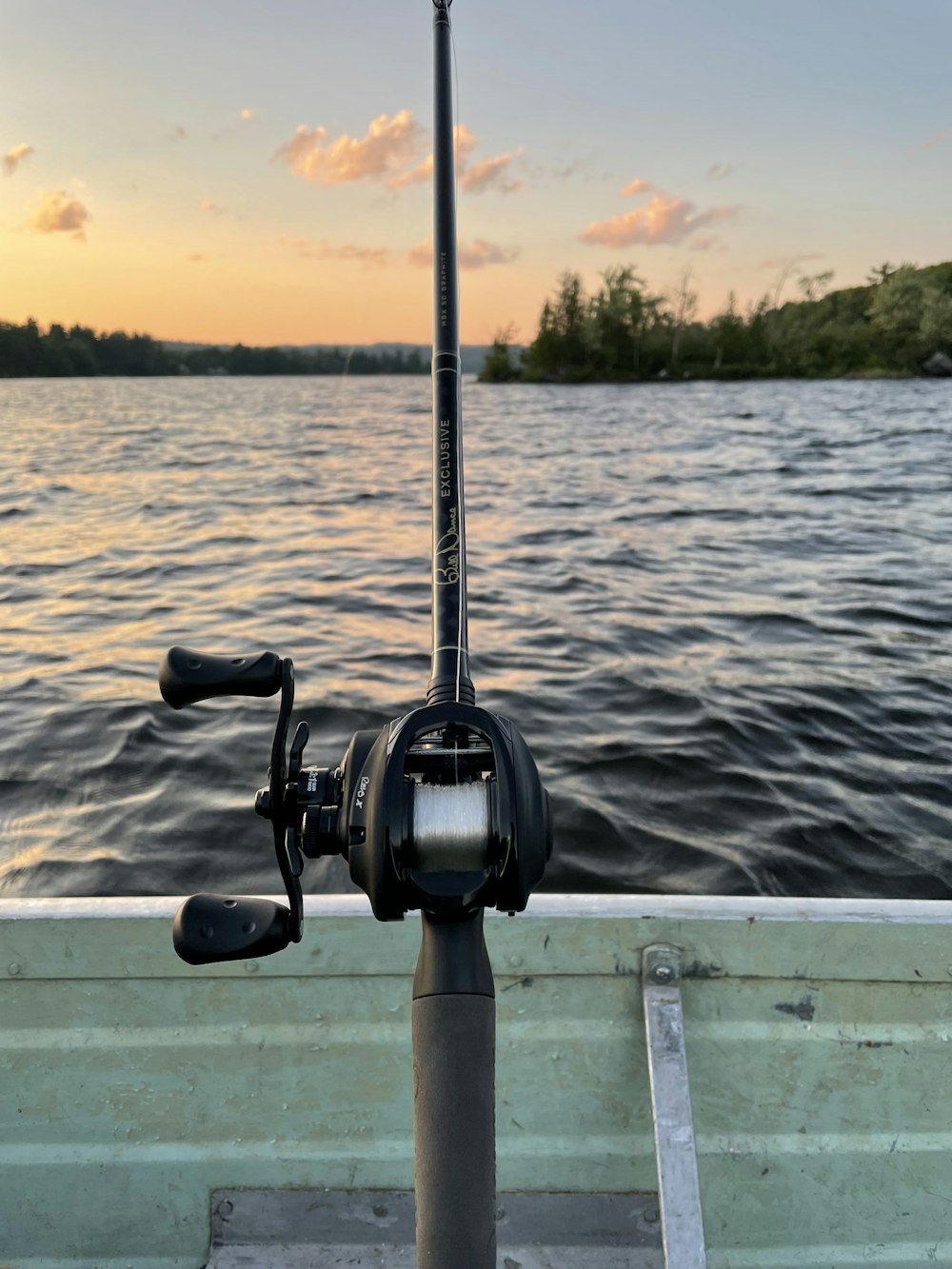 a fishing rod on a boat in the water