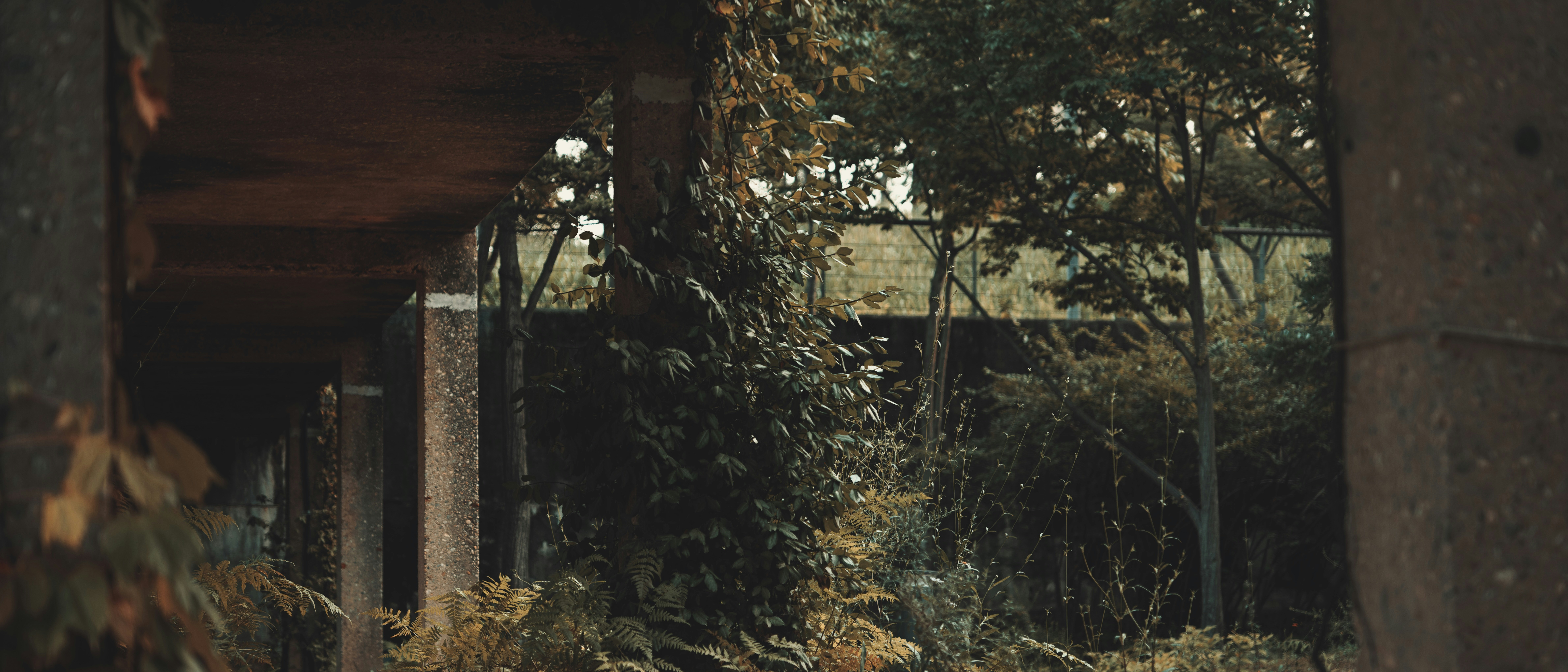 a stop sign sitting on the side of a building