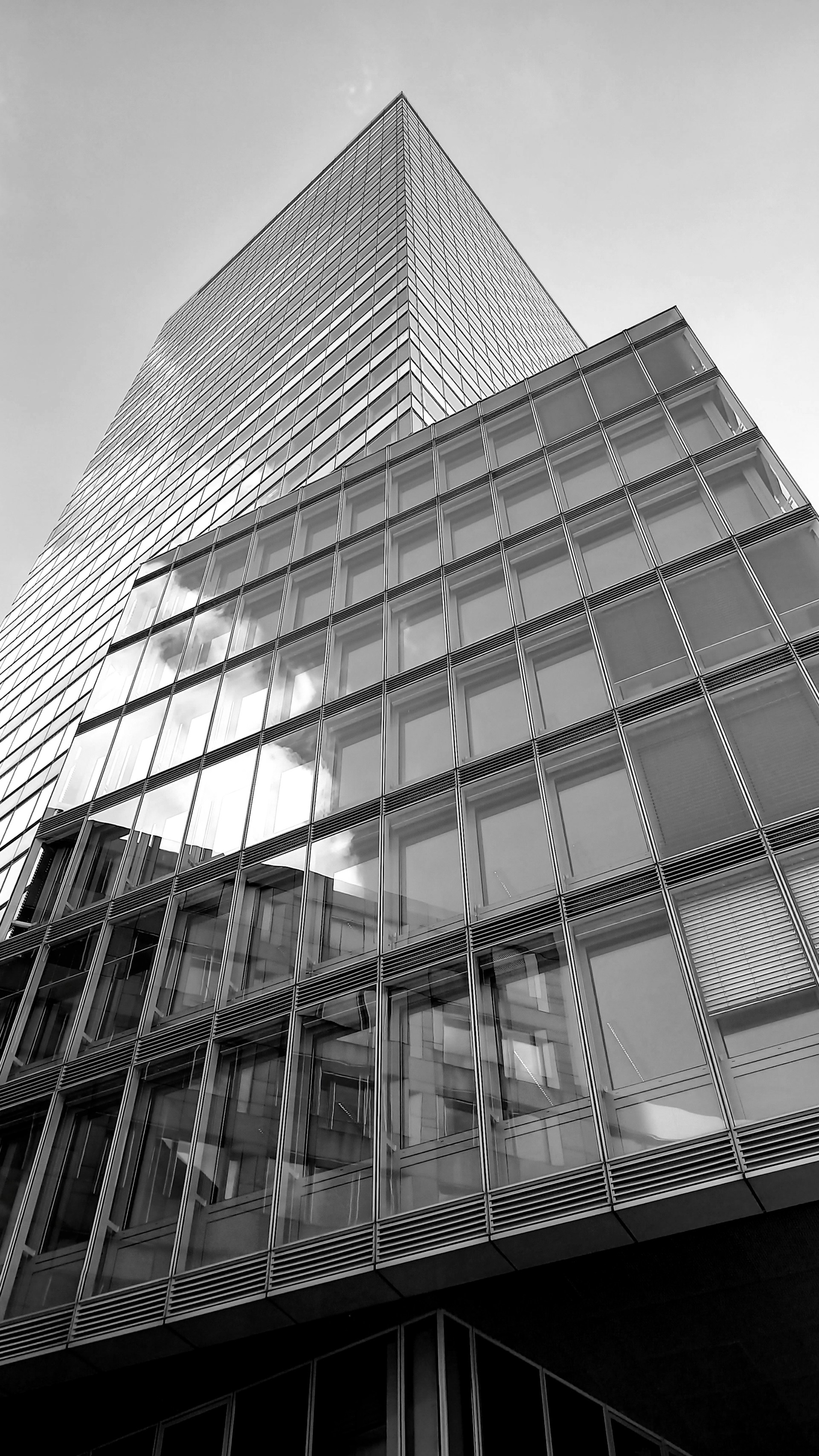 a black and white photo of a tall building
