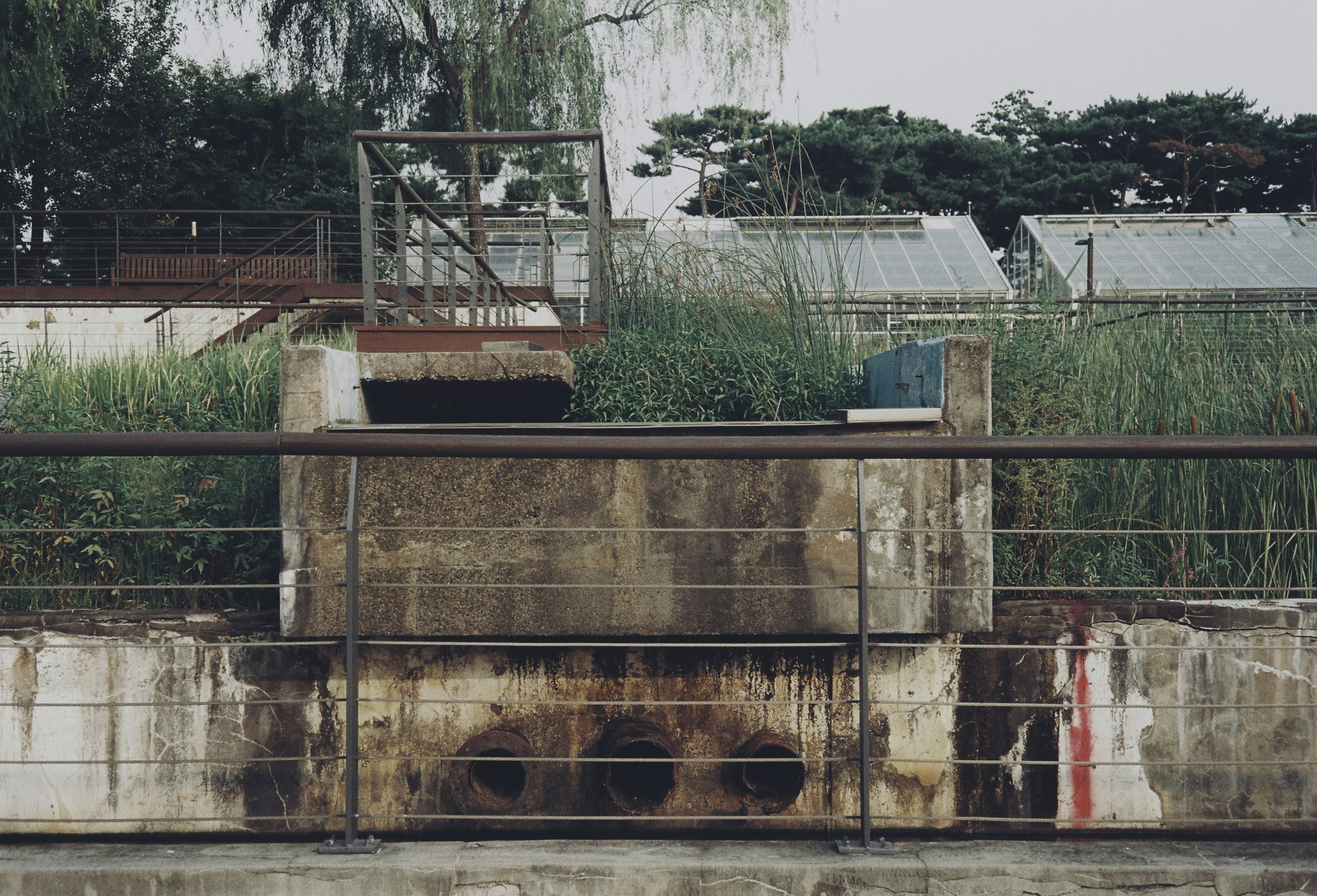 a generator being installed on a concrete pad outside a home - "Which companies in the Sacramento area specialize in whole home generators installation?"