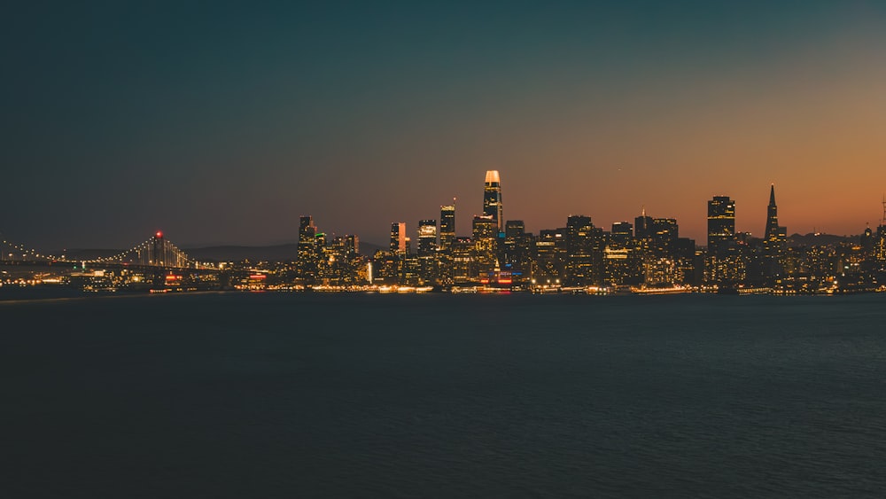 a view of a city at night from across the water