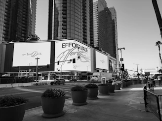A sleek black-and-white still from a recent TV commercial showcasing dynamic urban scenes.