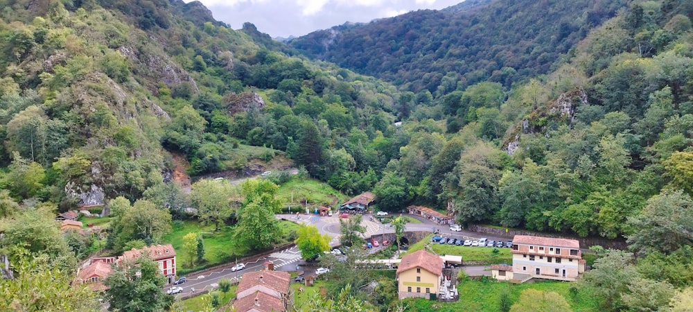 an aerial view of a village in the mountains