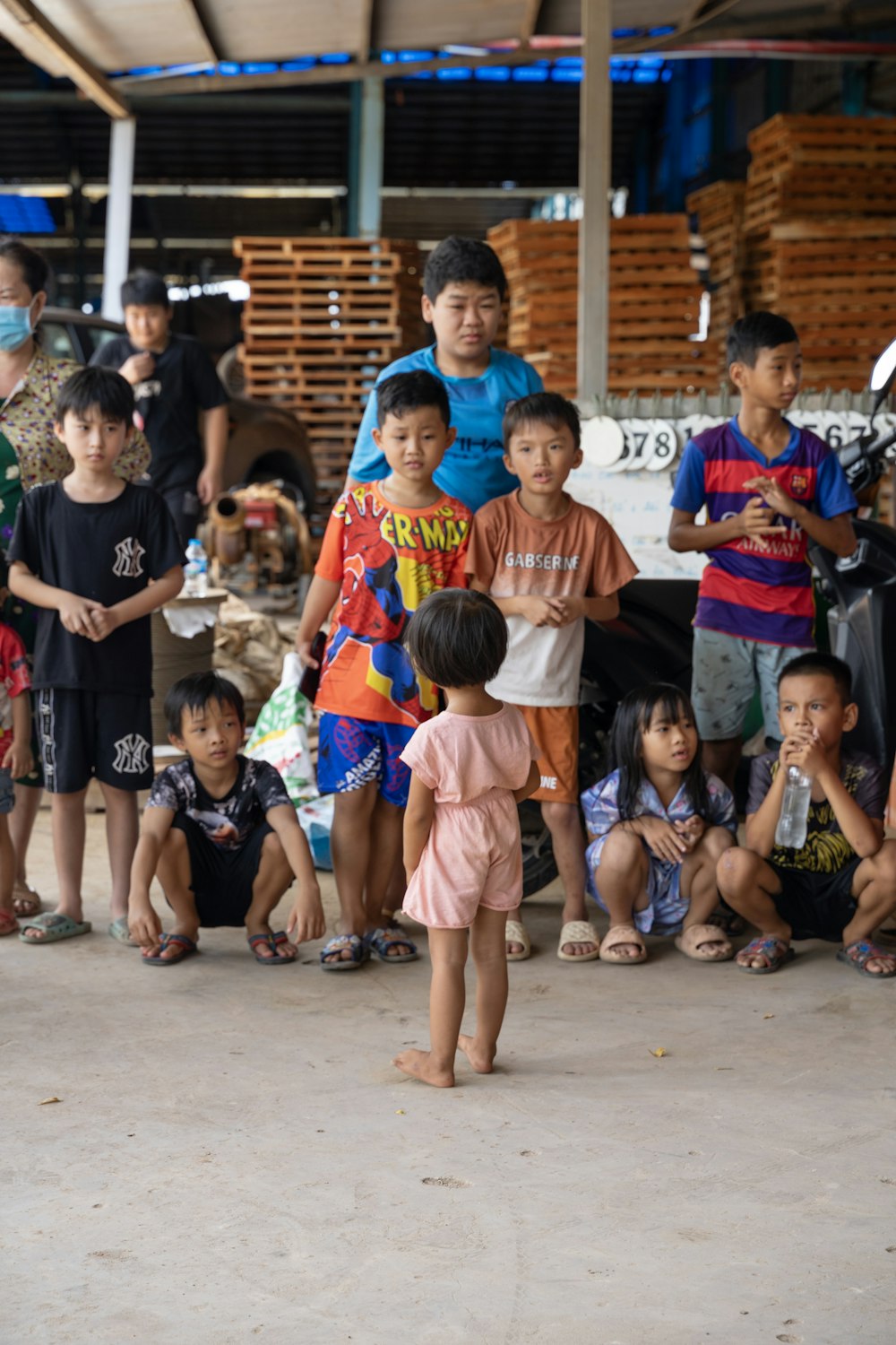 a group of children standing next to each other